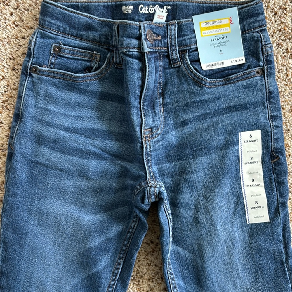 Kid jeans with flannel lining. New. Size 8